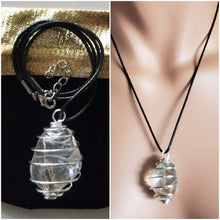 Load image into Gallery viewer, HIMALAYAN CRYSTAL SILVER PLATED CAGED PENDANT WITH 18&quot; L CORD &amp; GIFT POUCH.
